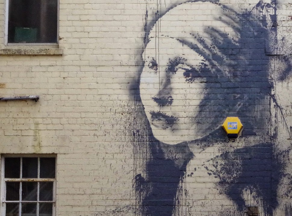 banksy mural graffiti bristol girl with the pierced eardrum uk banksy art 2