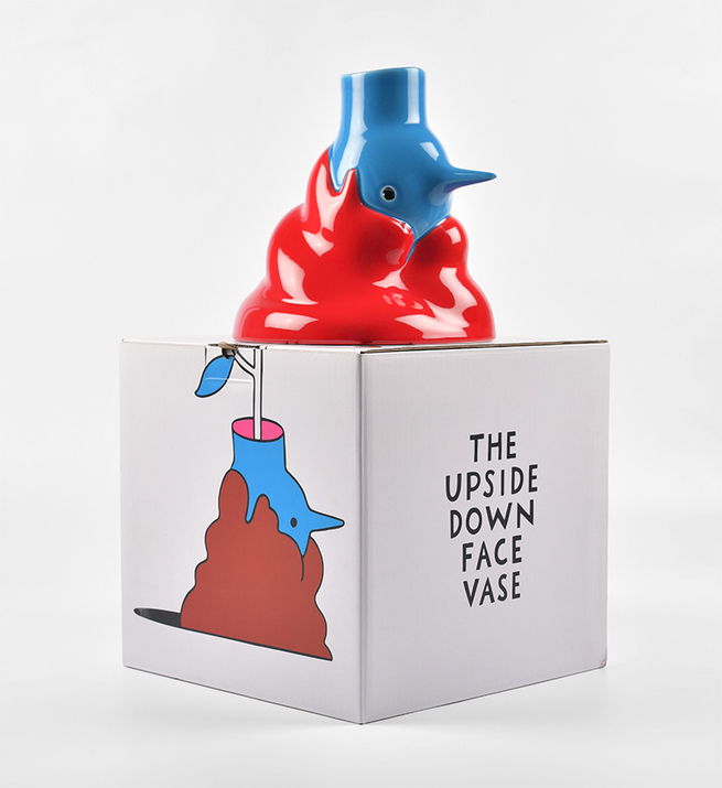 The upside down face vase (red hair)